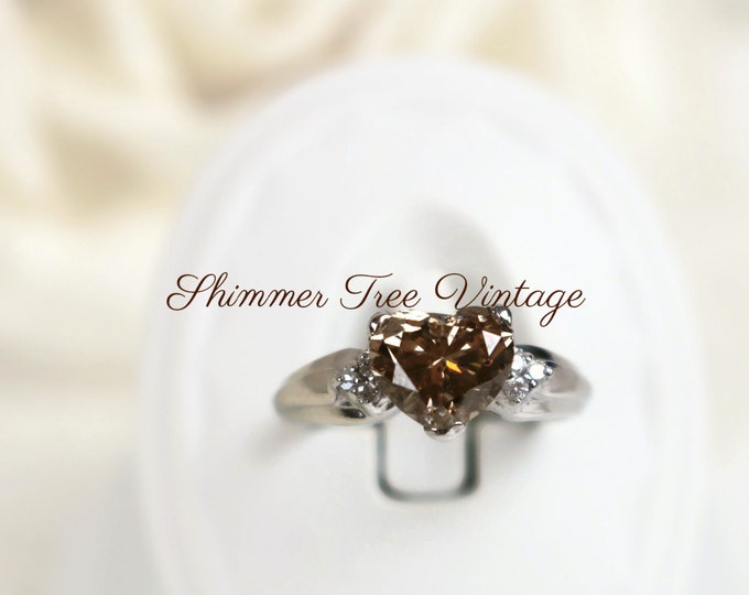 10K White Gold Diamond Ring. Fancy heart Shaped Cut and Colored Champagne 1.64 carat Diamond. Includes appraisal report