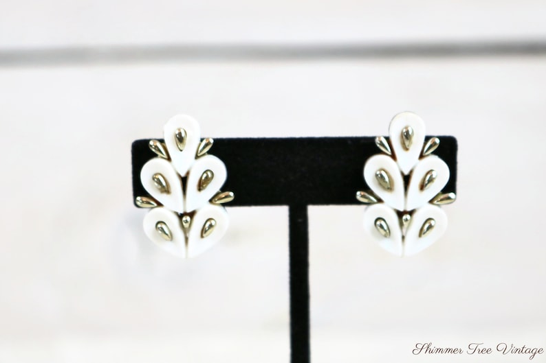CORO White Thermoset Lucite and silver tone Clip on Earrings