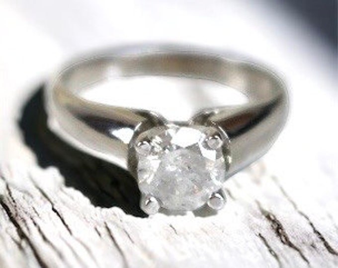 14 Karat White Gold Diamond Solitaire Engagement Ring.  Comes with Recent Appraisal Report.