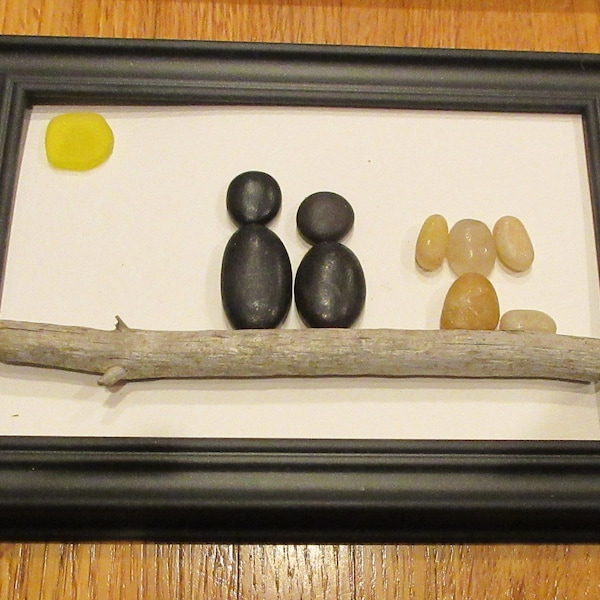SEA GLASS PEBBLE Art Picture "a  dog on driftwood with his owners in the warm sun "-framed in a black frame- free shipping usa-