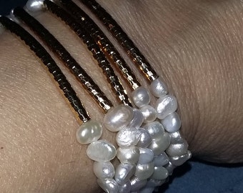 Set of 5 fresh water pearls with gold field tube