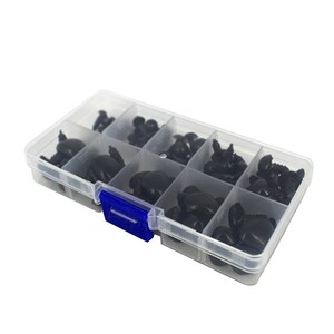May include: A clear plastic storage box filled with black plastic safety eyes for stuffed animals. The box has a blue latch.