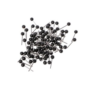 May include: A pile of black headed push pins with silver metal shafts.