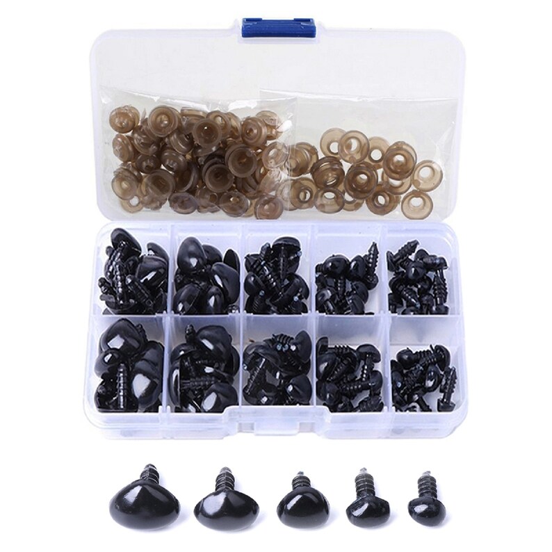May include: A clear plastic storage box filled with black plastic safety eyes and brown plastic washers. The box has 10 compartments and is organized by size. The safety eyes are in various sizes and have a black plastic washer on the back.