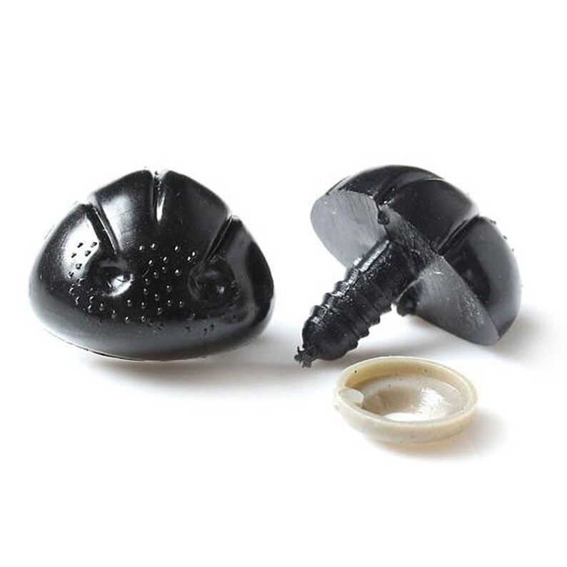 May include: Two black plastic safety eyes with a screw back and a washer. The eyes have a textured surface and a raised design.