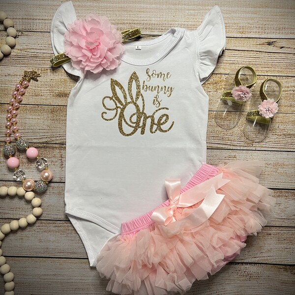 Baby girls Some Bunny is One First Birthday Tutu Outfit on a White Flutter sleeve bodysuit with Pale Pink Tutu with Optional accessories