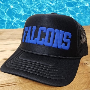 May include: Black trucker hat with a blue embroidered "FALCONS" logo.