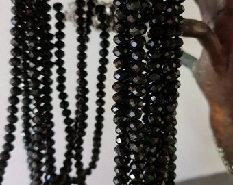 Lot de 700 perles à facettes cristal de  8x6mm noir