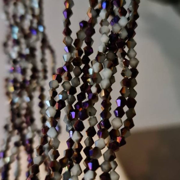 Lot de 1040 perles à facettes toupies en verre cristal de  4mm  violet et gris ab
