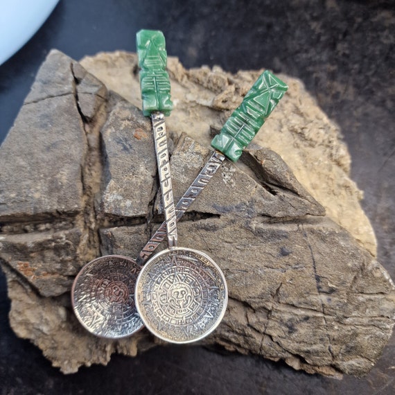 Old Mexican spoons made of 925 silver and green calcite Mayan calendar Acapulco