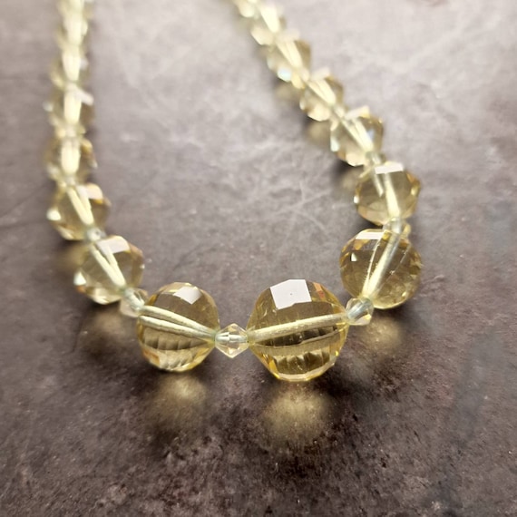 Great Art Deco 1920s glass necklace yellow ground ball cut glass