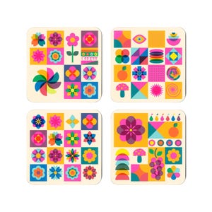 May include: A set of four square coasters featuring a grid of colorful geometric patterns, stylized flowers, mushrooms, fruits, and abstract shapes in vibrant shades of pink, blue, yellow, orange, and green on a light cream background.