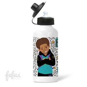 May include: White water bottle with a black lid and a colorful design featuring a cartoon boy wearing a turquoise and black hoodie with a purple backpack. The design also includes a yellow star and a geometric pattern.