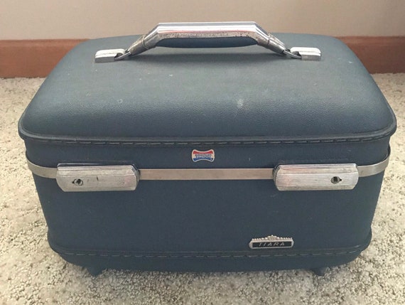 american tourister train case