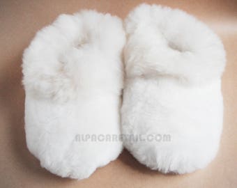 white fluffy house slippers