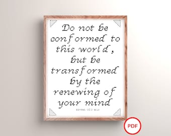 May include: A framed printable with a black and white pixelated design of a Bible verse from Romans 12:2, "Do not be conformed to this world, but be transformed by the renewing of your mind." The verse is in black text on a white background. The frame is brown wood with a white mount.