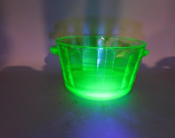 Vaseline glass handled bowl with lid