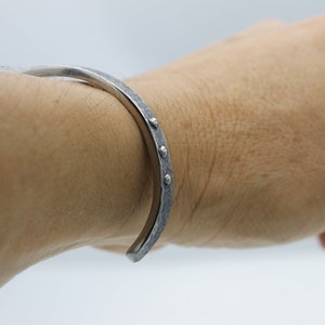 Handcrafted Titanium Cuff Bangle: Celtic-Inspired Men&#39;s Bracelet