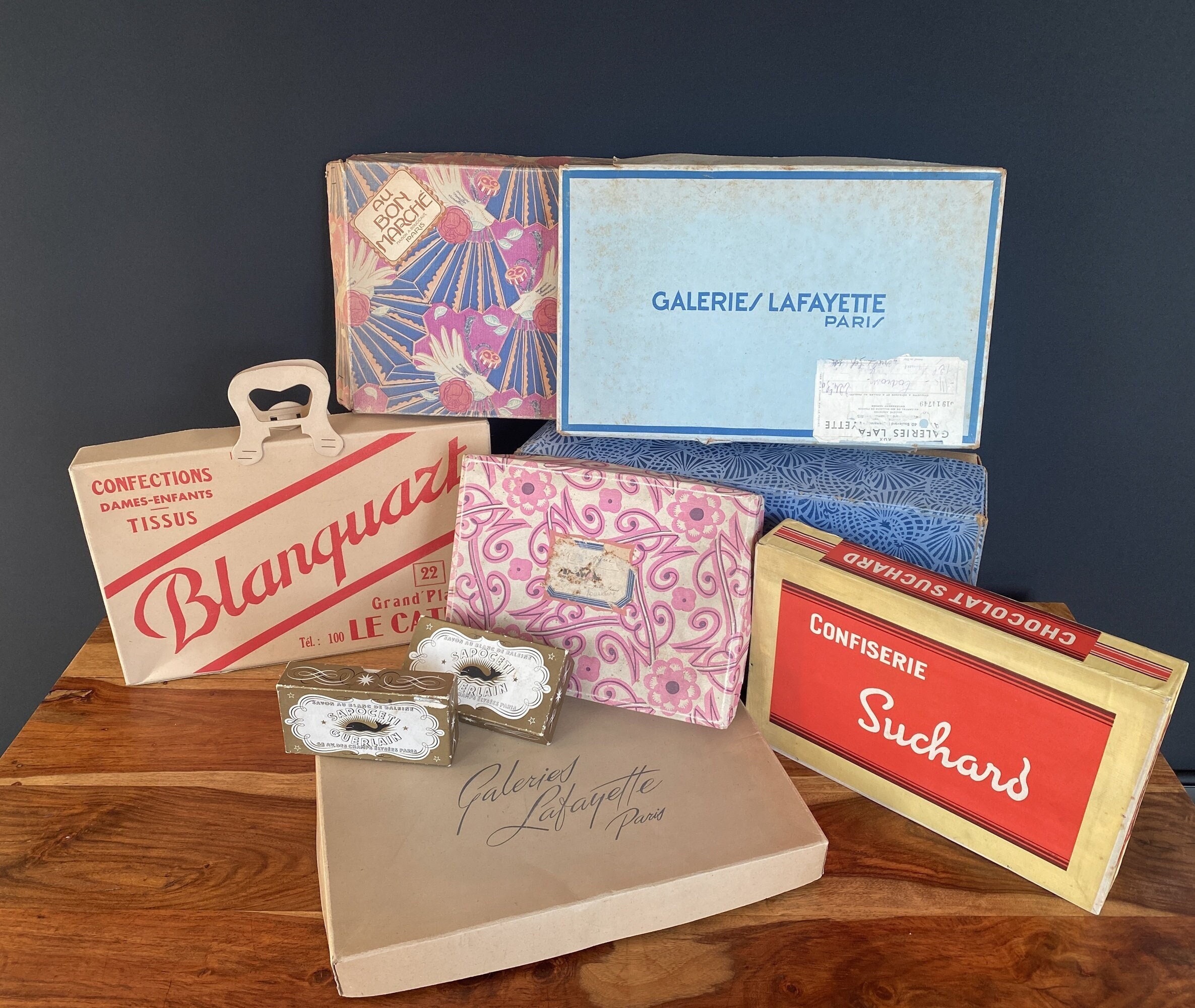 Collection of 9 Antique Parisian Store Boxes 1920s – 1950s : Guerlain, Le Bon Marché, Galeries Lafayette, Suchard