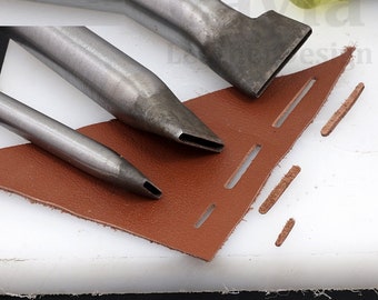 May include: Three metal leather stitching tools with different sized tips. The tools are on a brown leather surface with holes punched in it.