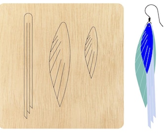 May include: A wooden template for making earrings. The template includes two leaf shapes and a long, thin shape. The template is shown next to a pair of finished earrings, which are blue and green.