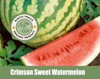 May include: A ripe, green watermelon with dark green stripes and a slice of watermelon showing the bright red flesh. The watermelon is labeled "Rustic Trails Organic Product".
