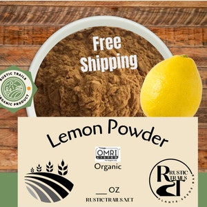 May include: A bowl of brown lemon powder with a whole yellow lemon. The image includes text that reads "Lemon Powder", "Organic", and "Rustic Trails". The product is labeled as an organic product.