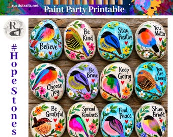 May include: A collection of twelve smooth, oval-shaped stones painted with colourful birds, floral accents, and inspirational phrases including Believe, Be Kind, Stay Positive, You Matter, Choose Joy, Be Brave, Keep Going, You Are Loved, Be Grateful, Spread Kindness, Find Peace, and Shine Bright.