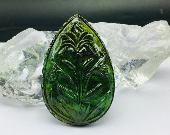 Natural GREEN TOURMALINE/Width 41.75MM/Length 62.88MM/Height 9.00MM/Weight 185.75 carats/Beautiful open green color carving on Tourmaline