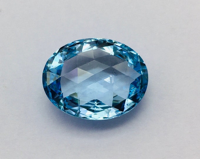 Blue topaz chaker cut stone/ oval shape/ width 16.00mm/ length 20.00mm/ height 8.50mm/ piece 1/ weight 22.00 carat/ price 255.00 us dollar