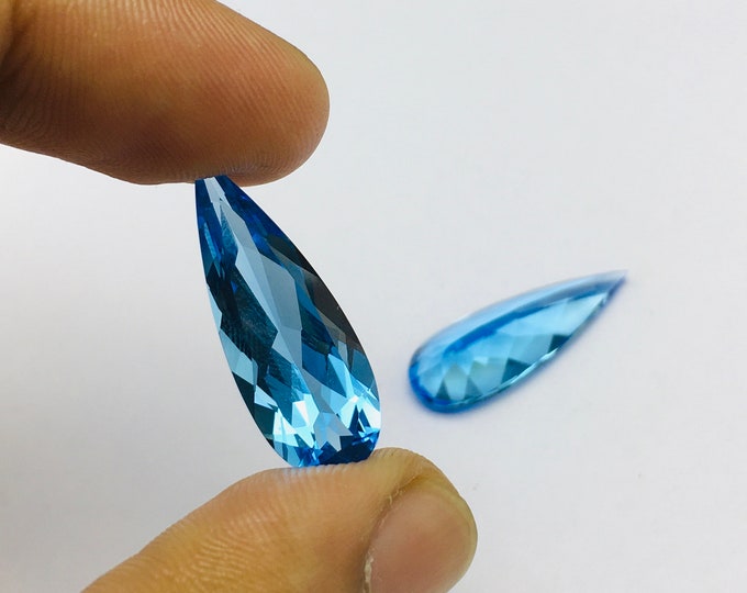 Genuine SWISS BLUE TOPAZ/Pear shape/Width 10MM/Length 27MM/Height 6.50MM/Weight 23.00 carat/Beautiful pair for earrings/For jewelery makers