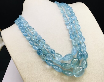 Natural AQUAMARINE/Smooth/Tumble/7x9MM till 18x20MM/766.05 Cts/23"/4350.00 Dollars/Beautiful deep blue color/Adjustable silk cord closure.