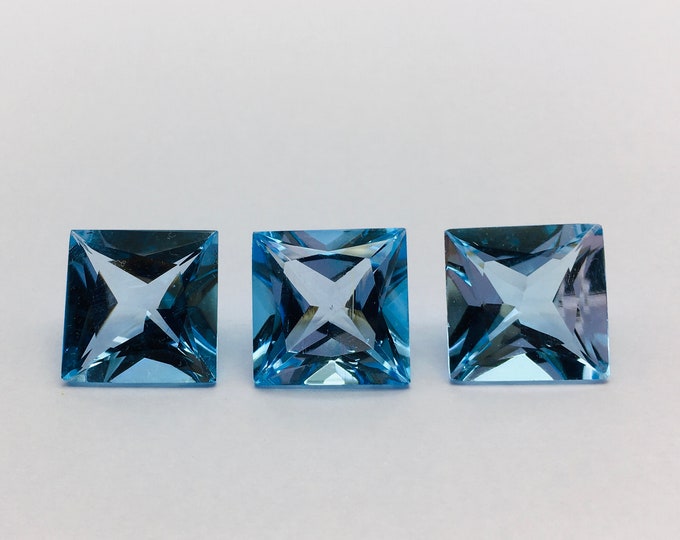Blue topaz cut stone/ square shape/ princess cut/ width 15.00mm/ length 15.00mm/ height 9.50mm/ weight 16.15 carat/ price 133.00 usa dollar