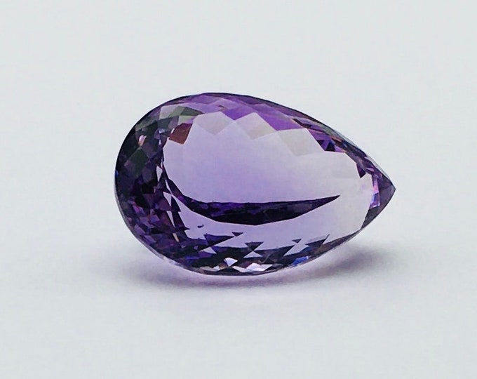 Amethyst cut stone/ pear shape/ width 14.17mm/ length 20.80mm/ height 10.80mm/ weight 18.20 carat / price 82.00 us dollar/ natural gemstone
