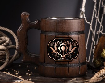 May include: A dark brown wooden beer mug with a carved handle and a metal interior. The mug features a black and copper emblem with the word "Cleric" on it. The mug is designed to look like a barrel.