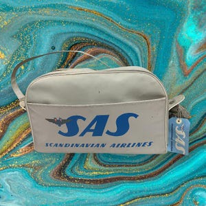 コンチネンタル航空 トラベルバッグ【レア】 s-l1200.jpg