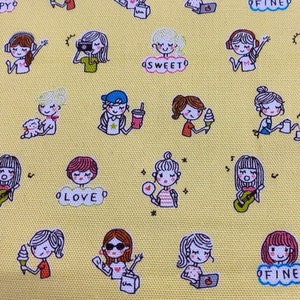 May include: Yellow fabric with a repeating pattern of cartoon girls in various poses. The girls are wearing different outfits and accessories, and some are holding objects like ice cream cones, cameras, and coffee cups. The fabric has the words "LOVE", "SWEET", "FINE", and "HAPPY" printed on it.