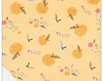 May include: A yellow fabric with a repeating pattern of orange fruit and the Japanese word "orange" written in black.