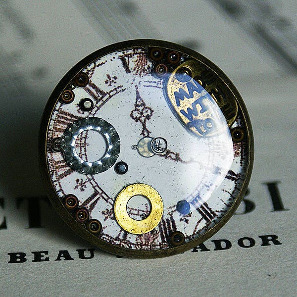 Grande bague ronde effet montre style vintage