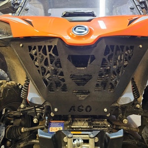 May include: Front view of an orange and black off-road vehicle with a black metal grill and the word "ASO" printed on the front.