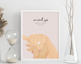 May include: A pink and white printable engagement announcement with the text "we said yes" and the names Dorota & Emilio and the date 13.05.2021. The image shows a couple's hands intertwined with a diamond ring on the woman's finger.