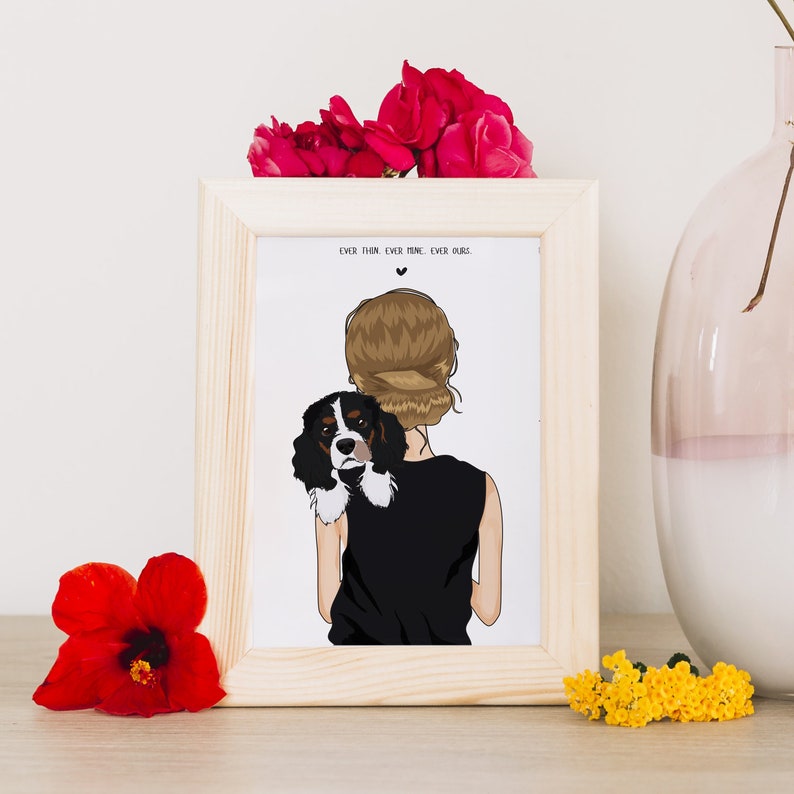 May include: A framed illustration of a woman with brown hair holding a black and white dog. The text "Ever thine, ever mine, ever ours." is printed on the white background.