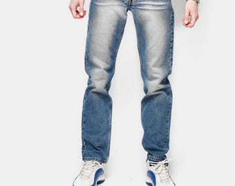 Vintage 90s Carrera The Blue Age 710 Italian jeans men's | Regular straight leg heavyweight stonewash denim | Made in Italy | W33 L34 L size