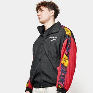 90er Jahre Retro Windjacke Schwarz Rot | Mehrfarbige winddichte Jacke Herren | Vintage abstrakt gemustertes Festival Rave 80er Jahre Zip Top | Größe M (Medium).