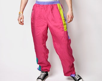 Vintage 80s sport shell wind pants in pink multi colour | Old School 90s style streetwear active wear athletic track pants joggers | Large L