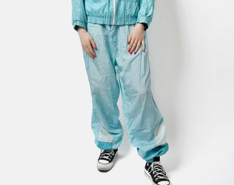 Vintage joggers in sky blue colour for women | 90s retro lightweight sport shell pants | 80s style track trousers wind bottom | Large L size