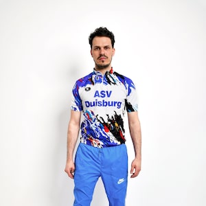 Camisa de ciclismo masculina dos anos 90, branca, azul, multicolorida | Camiseta vintage ousada para corrida dos anos 80 | Camisa esportiva retrô de manga curta para ciclismo | P/M