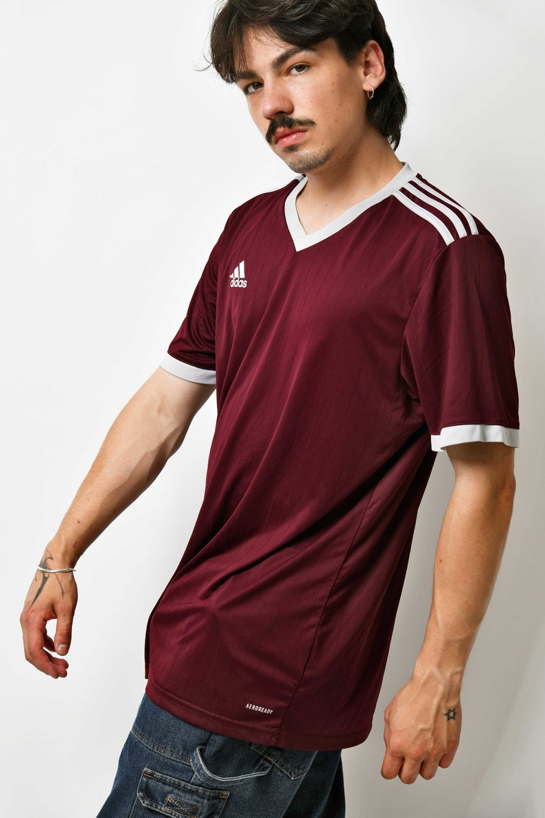 Y2K ADIDAS v-neck sports shirt for men in maroon red colour.