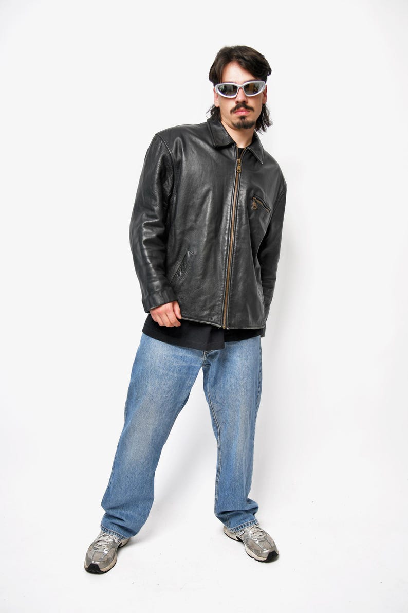 Vintage black real leather men's heavy jacket.