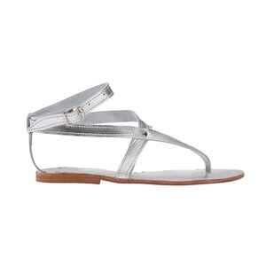 May include: Silver leather sandals with a buckle closure and criss-cross straps.